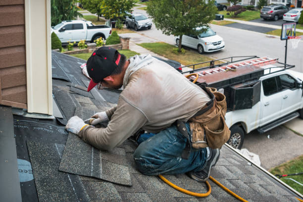 Professional Roofing technician working in Waldwick, NJ